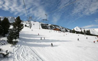 A view up a piste in the popular Bulgaria ski holiday destination of Bansko