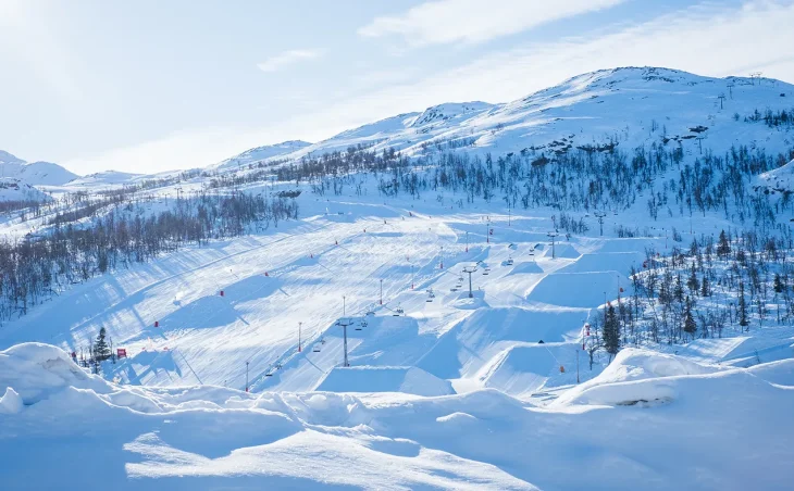 A picture of Hemsedal Ski Centre Norway. The slopes are treelined and quite making for a great destination for a ski holiday in Norway